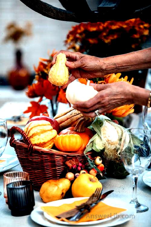 People holding garlic in the brown woven basket