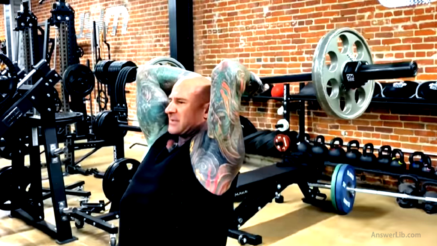 Use barbells for standing babeus triceps (Barbell Triceps Extension)